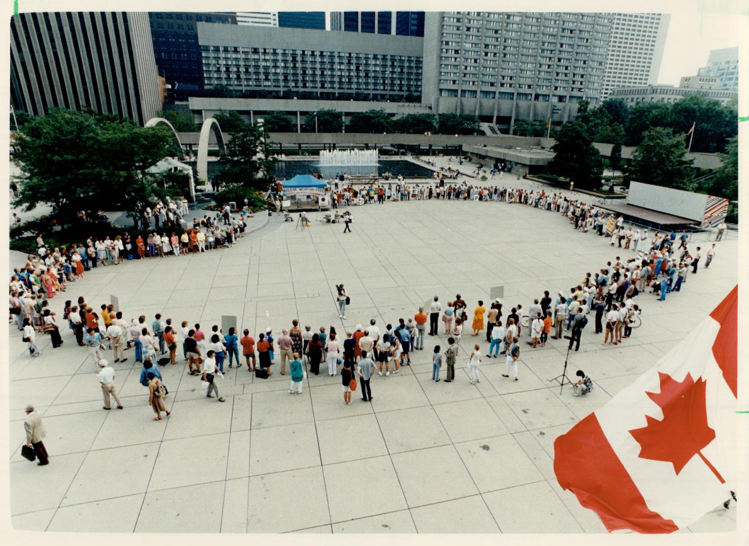 About 200 people gather in Nathan Phillips Square last night to mark 41st anniversary of the bombing of Hiroshima