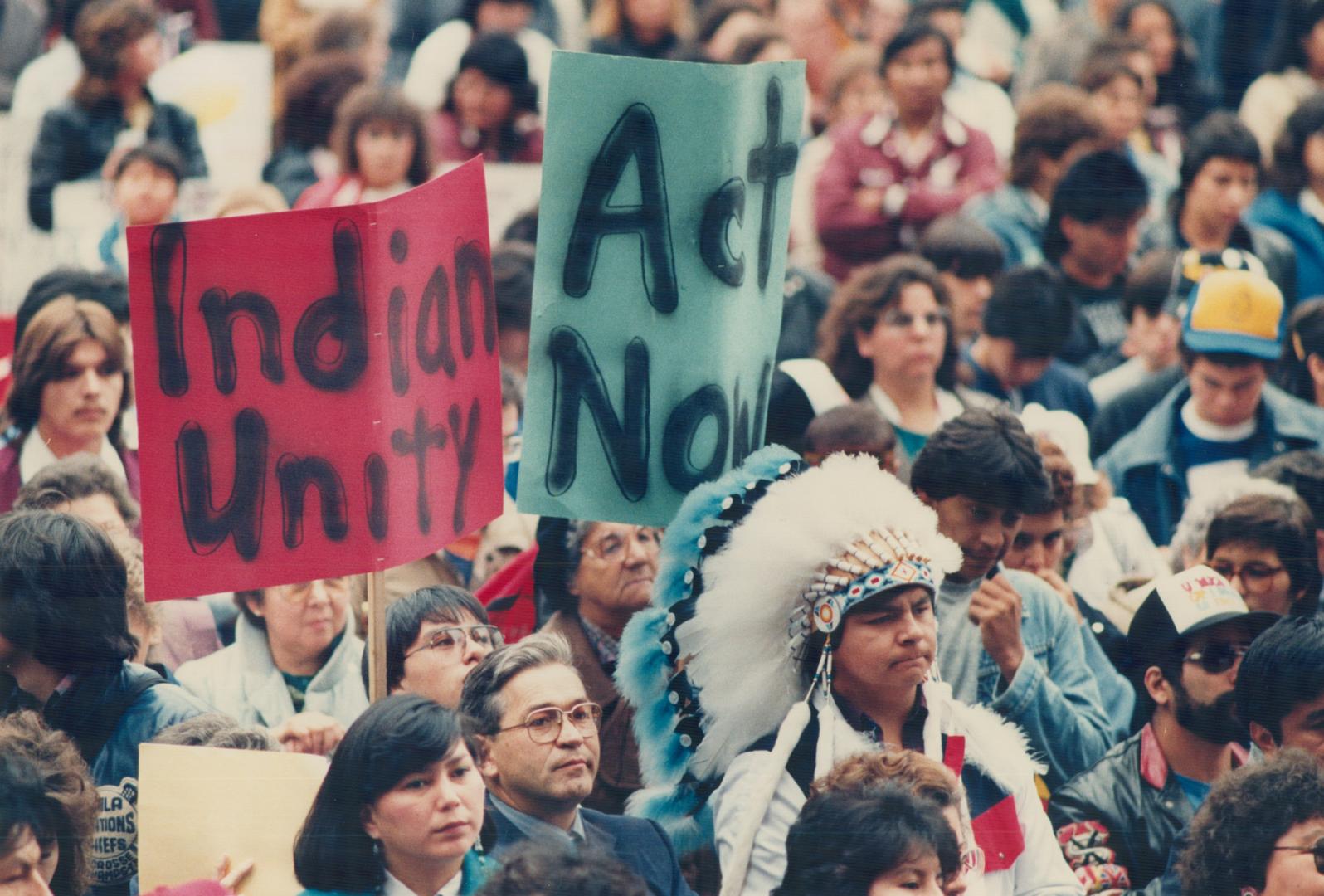 An estimated 3,500 native Indians and supporters crowd the lawns of Queen's Park yesterday for a rally demanding full rights for native peoples. They (...)