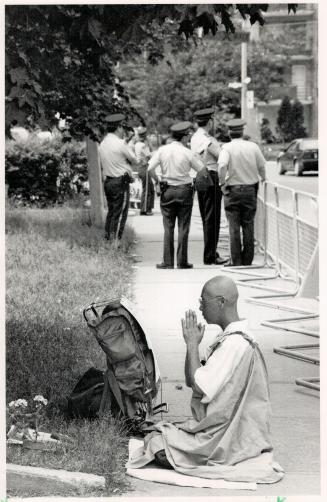 Mournful vigil, People of various nationalities hold a vigil in front of the Chinese consulate in Toronto
