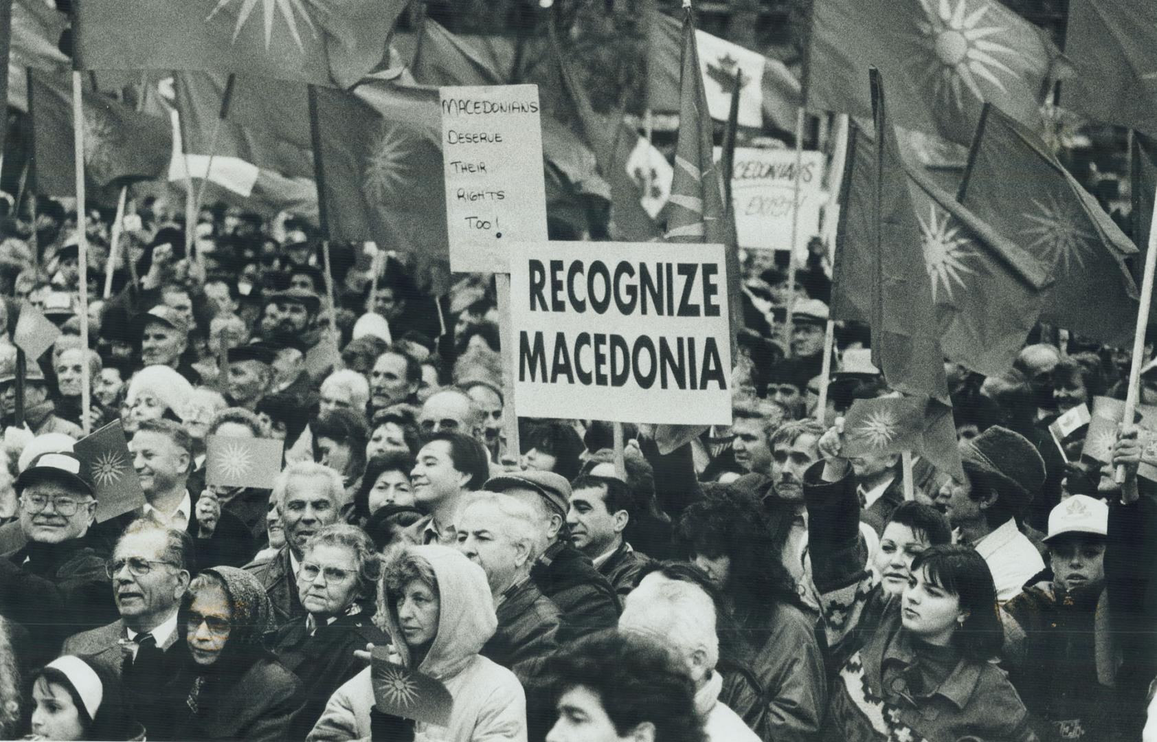 Thousands march yesterday in downtown Toronto celebrating Macedonia's declaration on Nov