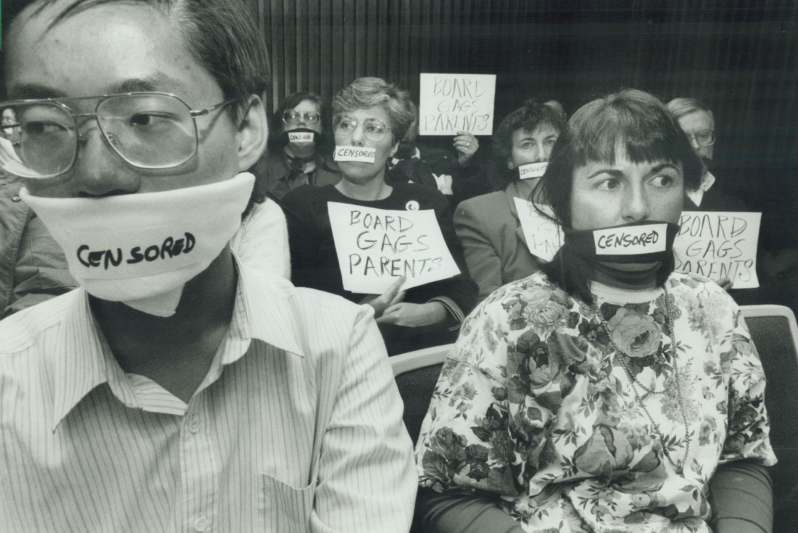 Anti-gay protest, Alan Kwan, left, and Lorraine Beck join others behind them to protest Toronto school board's refusal last night to reopen debate on (...)