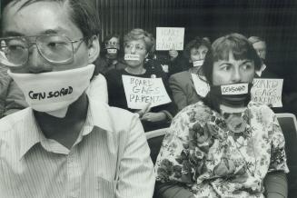 Anti-gay protest, Alan Kwan, left, and Lorraine Beck join others behind them to protest Toronto school board's refusal last night to reopen debate on (...)