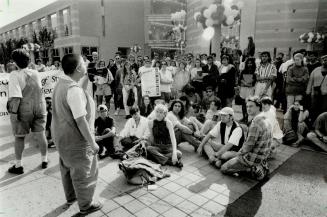 Cutback sit-in: Student Marcella Munro, left, addresses a rally yesterday at York University protesting the high cost of education
