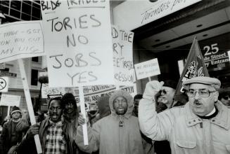 Pogey protest: Demonstrators rally outside Conservative party headquarters in downtown Toronto yesterday to protest federal government plans to restrict and cut unemployment insurance benefits