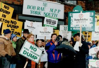 Led by Vaughan Councillor Peter Meffe (with megaphone), protesters outside Premier Bob Rae's York South constituency office on Eglinton Ave. W. voice (...)