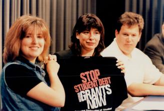 Sign of dissent: Catherine Mackinnon, Laura Burrows and Chris Kenopic take part in a demonstration at Queen's Park against funding changes for deaf students