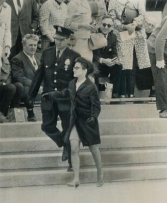 Anti-war protester nabbed, She was shouting during Johnson's visit
