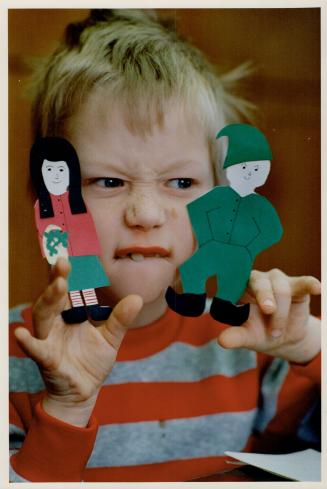 Meet my friends, Marc Elms, 6, of the YMCA's First Base day-care centre, puts his puppets through their dramatic paces