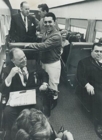 City council members set out for Montreal on the rapido, At left is Mayor Phillip Givens with Alderman Joseph Piccininni right
