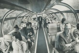 The Mural Lounge, the combination observation-bar car at the rear of the train, serves refreshments and a horizon-to-horizon view of mountain scenery.(...)