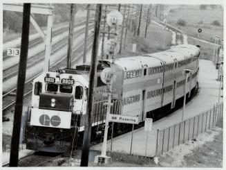Go Trains go Double-Decker, A double-decker Go train pulls into Pickering station yesterday, one of nine two-level trains borrowed from CP Rail for two weeks for a test on Go's lakeshore run