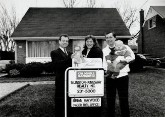 The freeland family, David, Dale and son Nathan, used the blue ribbon rating services of real estate agent Paul Lonergan, left, to help sell their hom(...)