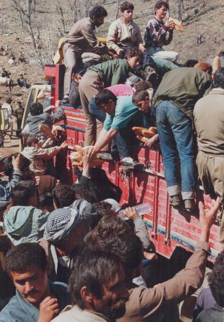 Kurds - Turkish - Iraq Border food arrival at Refg