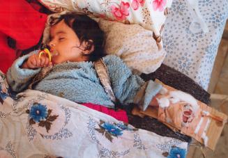 Kurds - Child in field Hospital at Silopi Refuge Camp, Turkey