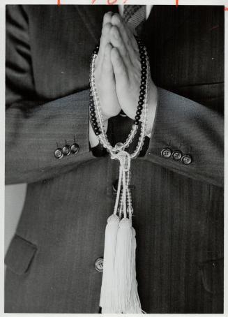 Buddhist Rosary, Gesture signifies peace