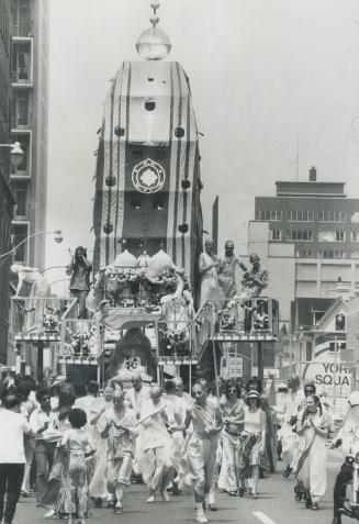 Krishna festival in Toronto, A 40-foot ratha, also called cart or chariot, towers over the parade of the Rathayatra Festival staged by the Internation(...)