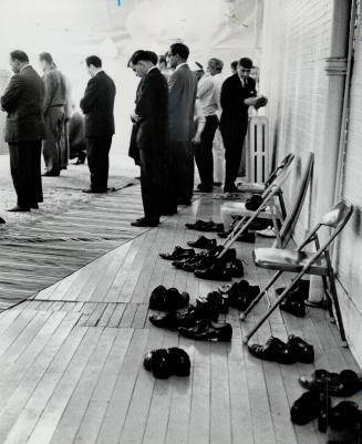 Shoes are left outside the mosque
