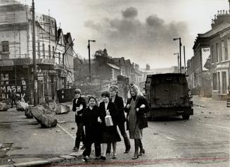 The violence in Northern Ireland has played havoc with communities, such as the Falls Road area of Belfast (centre)