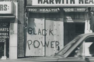 Boarded up. Black Power closes a store