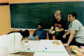 Class project: Erindale secondary students, from left, Anisa Hasanali, Aneal Bharratt, Damien Waddell and Jenny Ning work on politics assignment