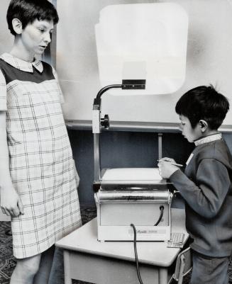 New ways of learning, including equipment like this overhead projector, used in Indian school in Muncey, Ont