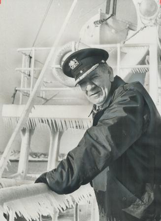 First ship into Toronto. Exhausted from 24 hours without sleep on a non-stop race from Sarnia, Captain Joseph Dishaw leans on the rail of his 332-foot(...)