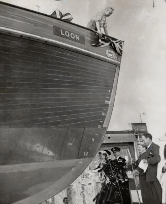 HMCS Loon, the first of an entirely new design of wooden ship slid from the ways of the builders J