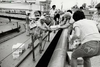 Interlude: Great Lakes freighter crewmen taking on supplies