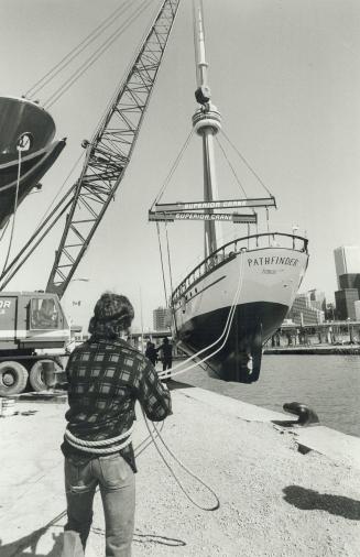 Launching the tall ships, With the CN Tower in the background, appearing to rise from its decks like a mast, Pathfinder, one of Toronto's two tall shi(...)