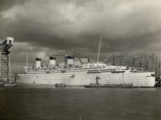 The Queen Mary as she nears completion in the Glasgow shipyards