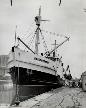 The mission ship is seen at Montreal dock awaiting last of cargo