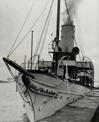 Captain Scott Misener, turned the $1,000,000 ship over to the government