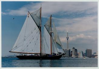 The schooner Bluenose II sails into Toronto yesterday on its third visit to Lake Ontario