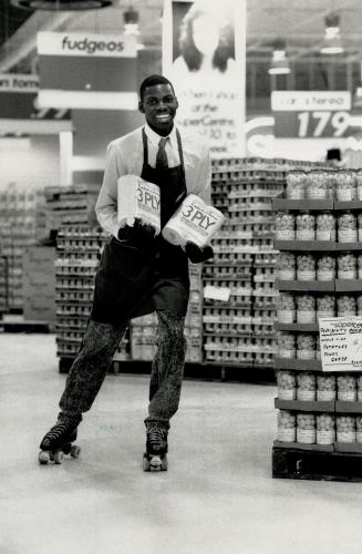 Stock in motion his stock-in-trade, When merchandise needs moving at Toronto's largest grocery store, The Super Centre at Eglinton and Victoria Park A(...)