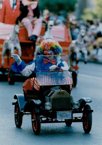 Watched as the Shriners' clowns wheeled their way down Toronto streets one last time yesterday evening