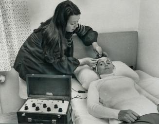 Black and white photograph depicting electrical treatment is used in a Toronto hospital to figh ...