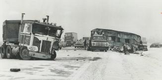Tractor-trailers pile up on the 401 in the snow, The eastbound lanes of Highway 401 are blocked by trucks and tractor-trailers that jackknifed and cra(...)