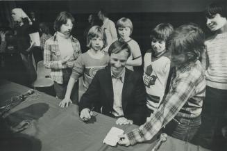 Swiss astronaut Claude Nicollier talks to children at Science Centre