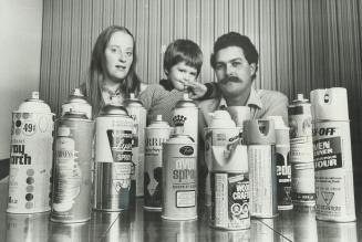 An average array of spray cans found in a Canadian home is displayed by Joyce and Glen Luttrell, with son, Christopher, 4. Since 1968, Mrs. Luttrell h(...)