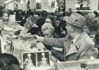 Getting started on next Christmas, Christmas cards and Christmas wrappings were on sale at half price today in the department stores and forward-looki(...)
