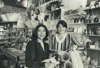 Dorothy Lucas, left, and Deanna Kearns check stock, They've worked hard for success of their shop, The General Store