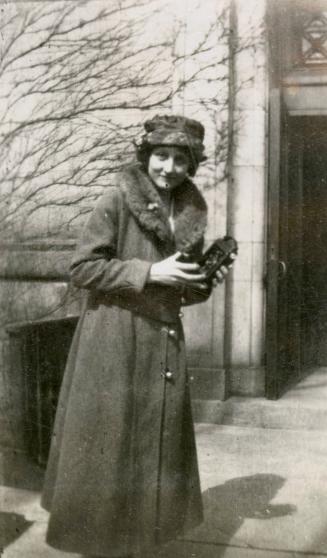 Toronto Public Library staff in front of Central Library, College Street, northwest corner of St