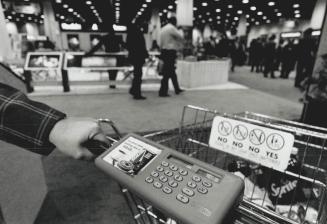 A solar-powered calculator can help grocery shoppers decide when it's time to stop filling up their cart