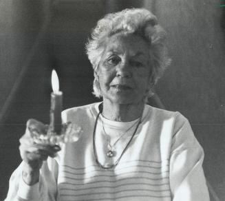 Candle power: For the third time in three years, Elizabeth Downey was without power for an extended period of time Saturday