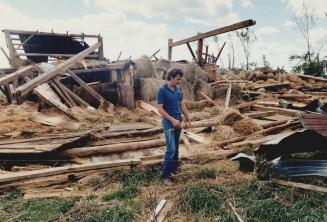 Farmer and flattened barn: Lloyd George lost just about everything when a twister hit Cricket Creek
