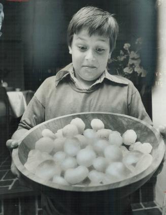 Really as big as Golfballs Ten-year-old Colm Lanigan of Etobicoke gathered these hailstones last night near his Meadowvale Dr. home after one of the w(...)