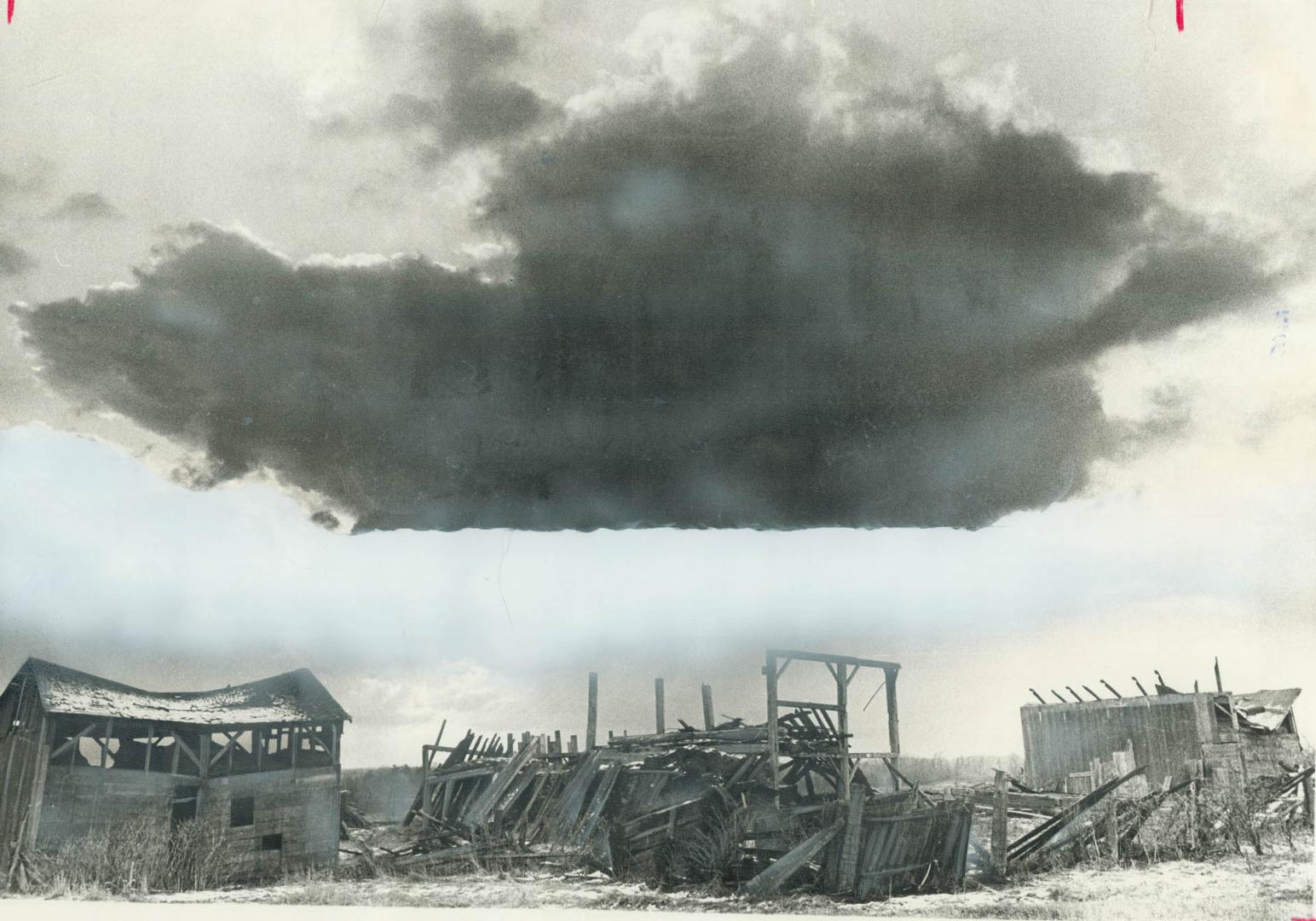 Storm clouds pass over a long abandoned farm just south of Georgetown yesterday, in the wake of Monday's storm which caused severe damage along shorel(...)