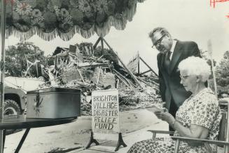 The senior citizens of Brighton have set up a booth to collect donations toward reparing damage caused by severe storm two weeks ago that ripped off r(...)