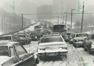Don mills Rd. is clogged with traffic as storm made roads treacherous