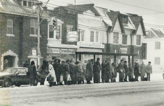 Passengers waited for streetcars on St